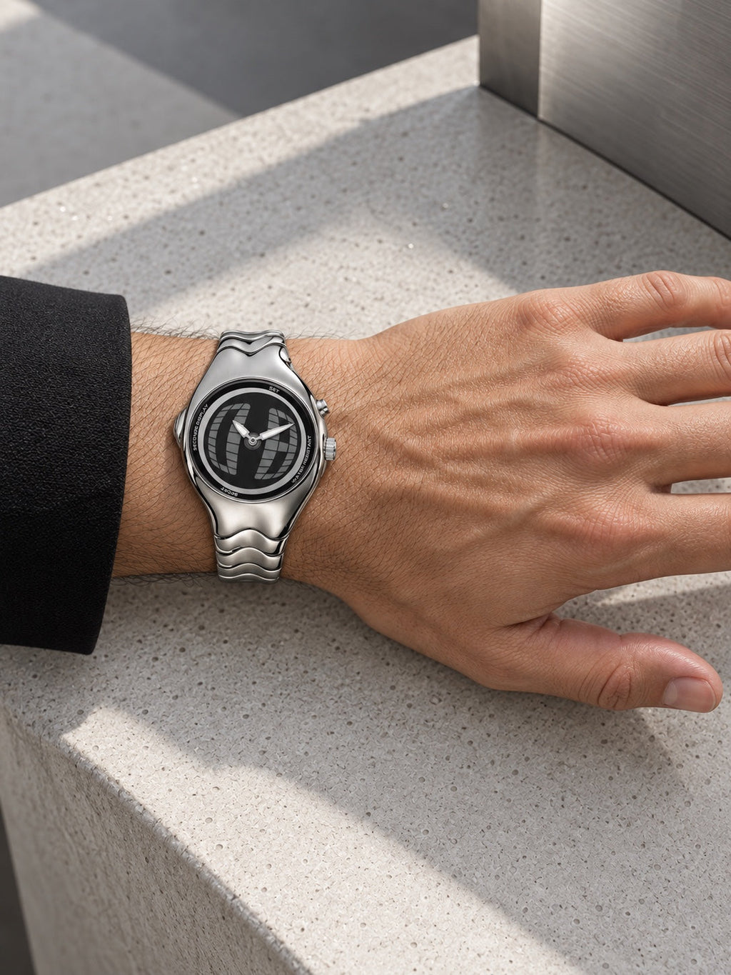 OTHERWHEN editorial-sculpted watch correctly worn with bracelet wrapped around the wrist